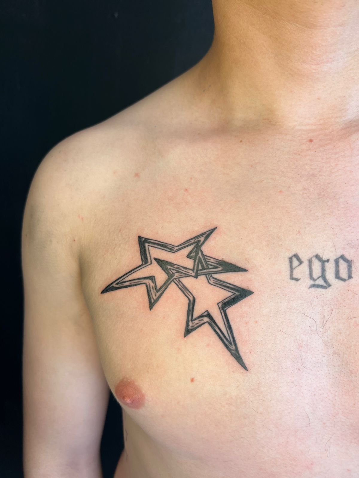 Tatuaje lettering gótico caligráfico